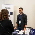 IPTV Reseller showcasing services at local tech fair, trusted provider.